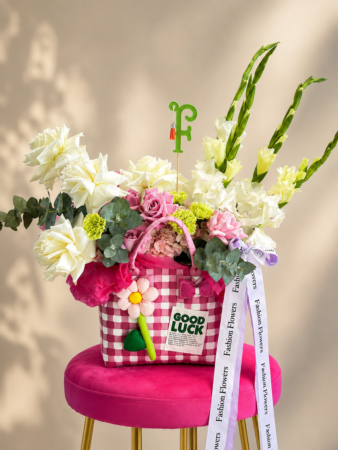 Lucky Bloom: fresh seasonal flowers, ribbons, decorative accessories in a flower bag arrangement