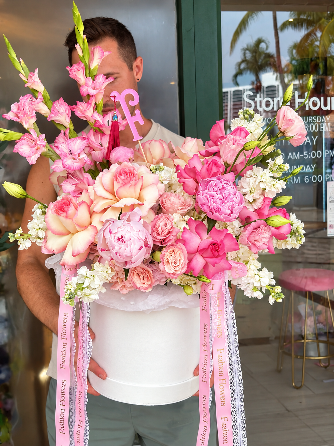Pink Majesty: roses, peonies or peony-style blooms, gladiolus, stock, spray roses in a flower box arrangement