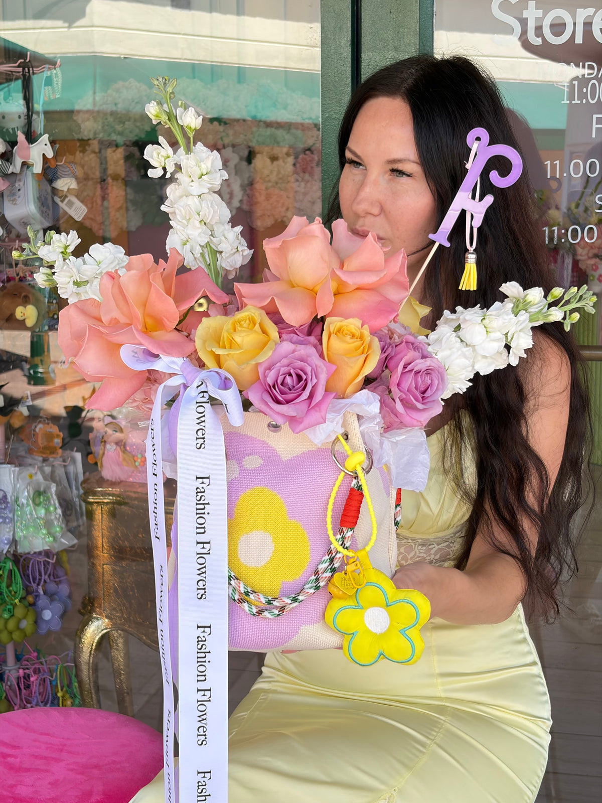 Flower Bag Arrangement of fresh seasonal flowers, ribbons, decorative accessories — Joy