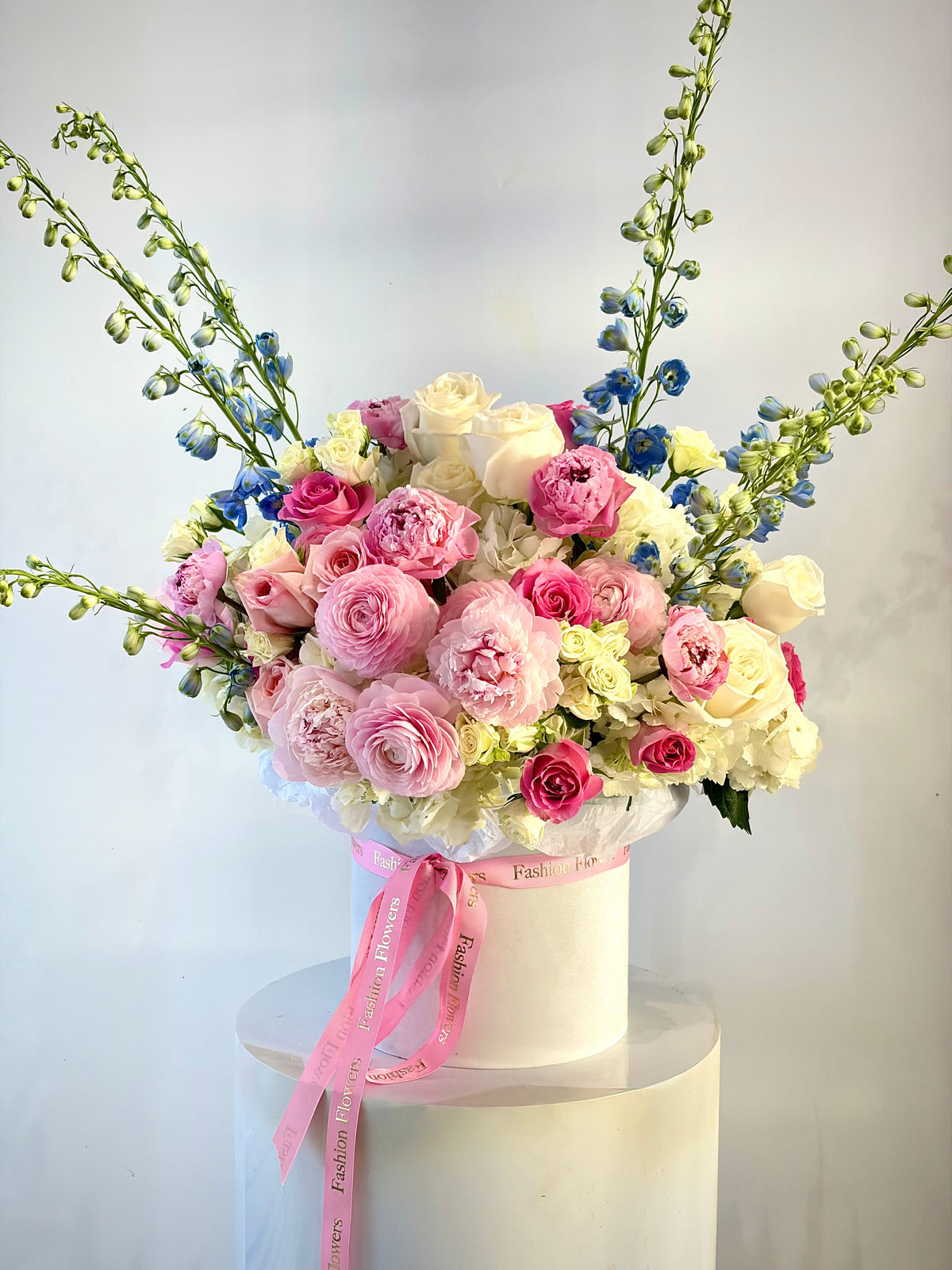 Flower Box Arrangement of roses, ranunculus, peonies, spray roses, hydrangeas, delphinium — Blush & Sky Garden