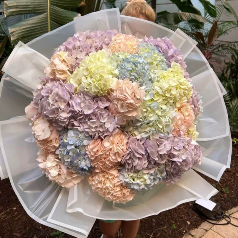 A large hydrangea bouquet – Cinderella smile in soft pastel tones.