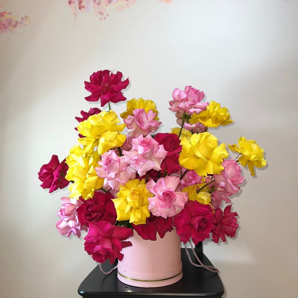 A bright mixed-roses bouquet â color carnival for elegant gifting.