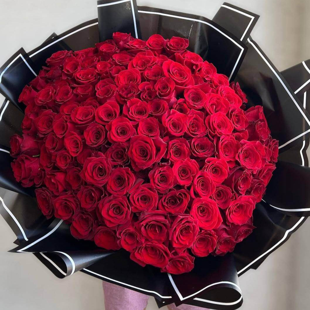 Crimson Elegance hand-tied bouquet with red roses â luxury flower delivery Miami for premium wardrobe moments