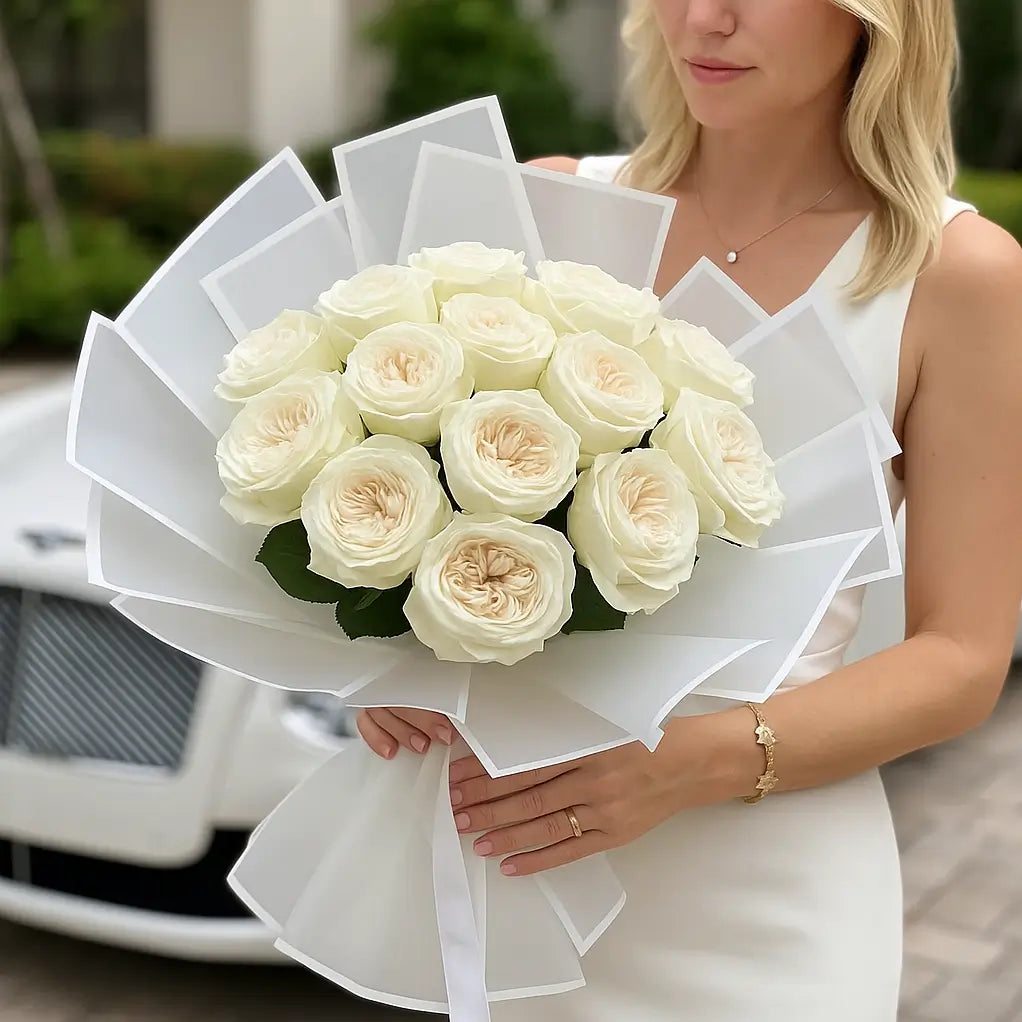 Divine Fragrance in white hand-tied bouquet with 25 cream roses — luxury flower delivery Miami with Bentley elegance