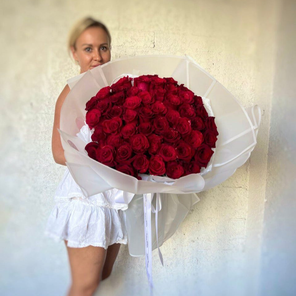 Luxury flower delivery of 150 small passionate red roses in a hand-tied bouquet – Endless Love edition for romantic gifting moments.