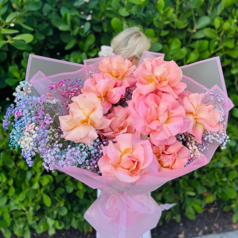 Luxury pink box bouquet with soft pink roses and pastel baby’s breath — flower delivery Miami