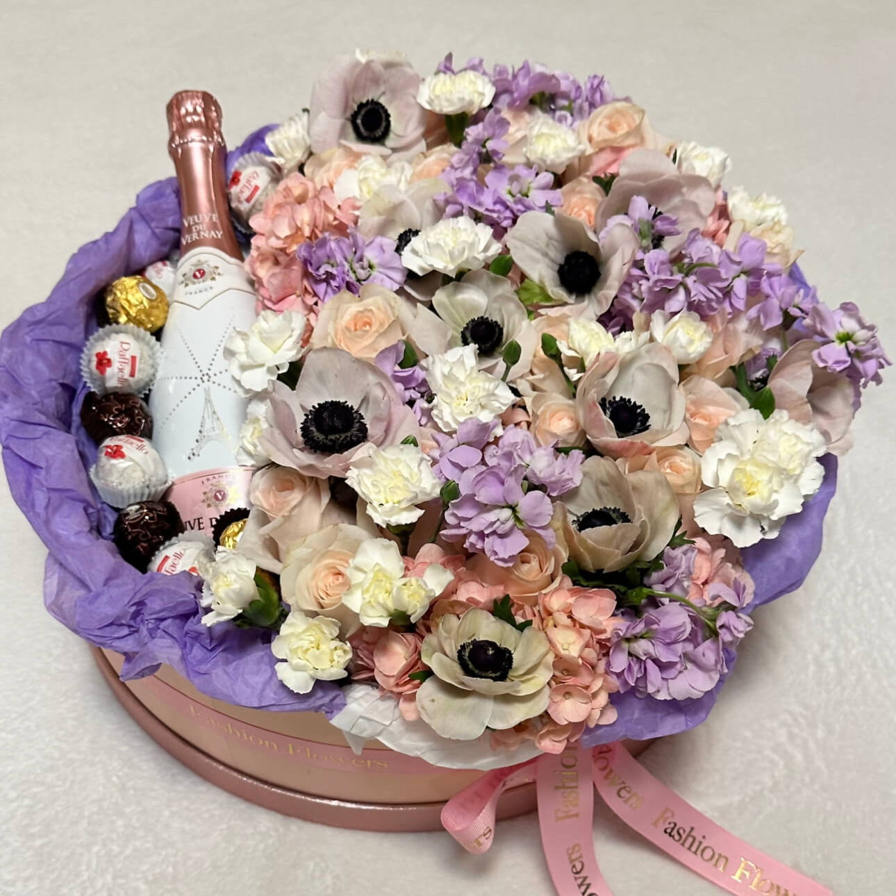 Designer flower box in champagne and blush shades with roses — romantic luxury gift delivery