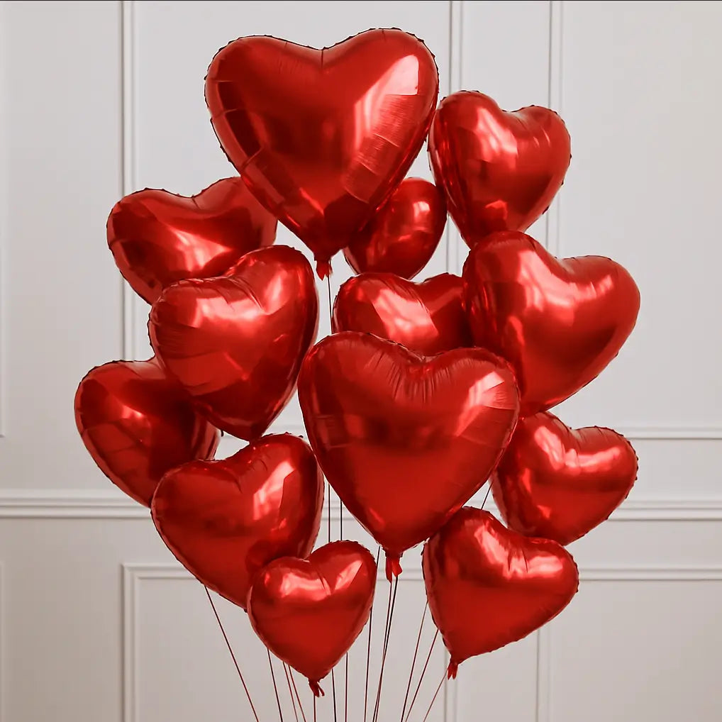 Cluster of red heart-shaped foil balloons in various sizes â romantic and luxurious decoration for any event