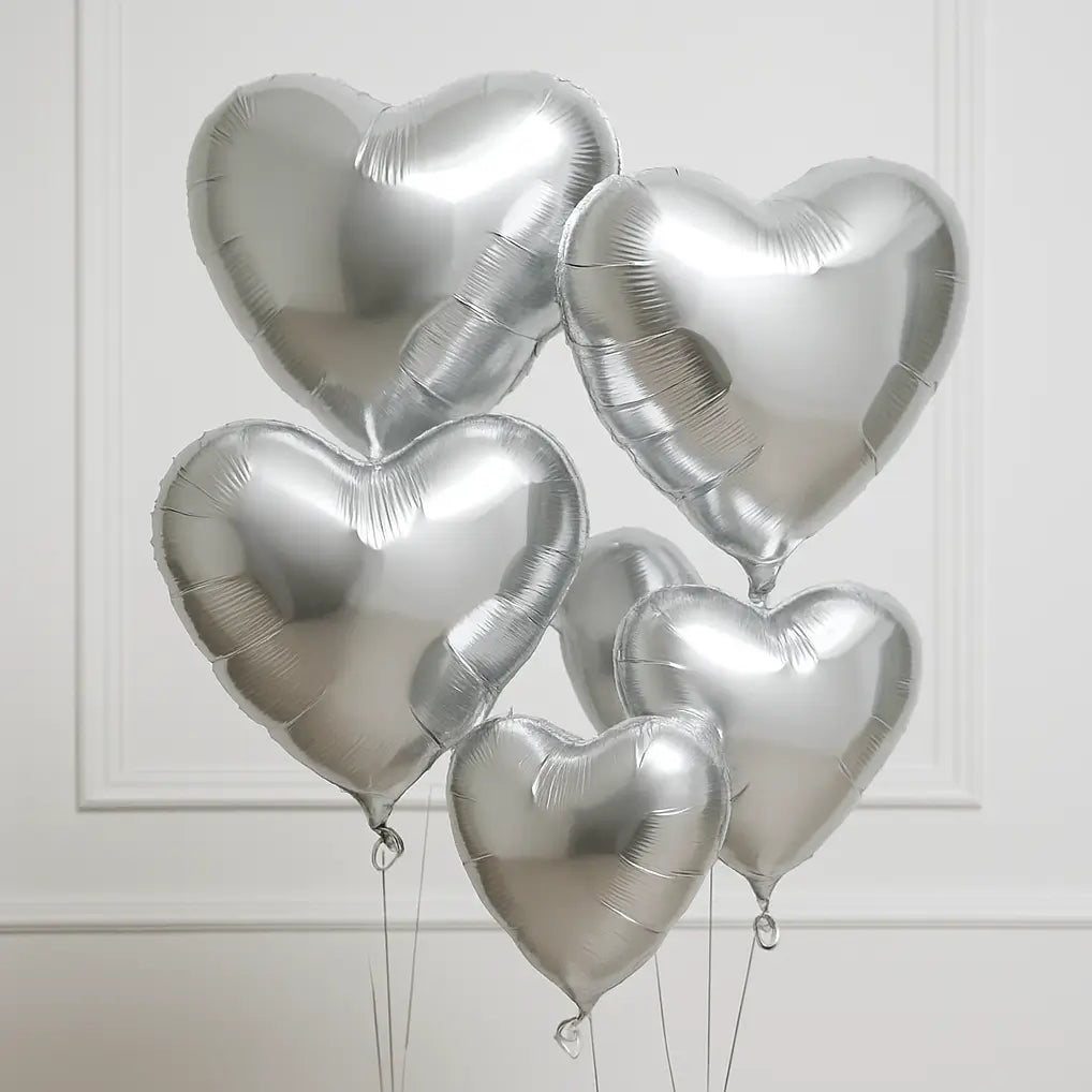 Cluster of luxury silver heart-shaped balloons in mixed sizes â elegant romantic decor for gifts or events