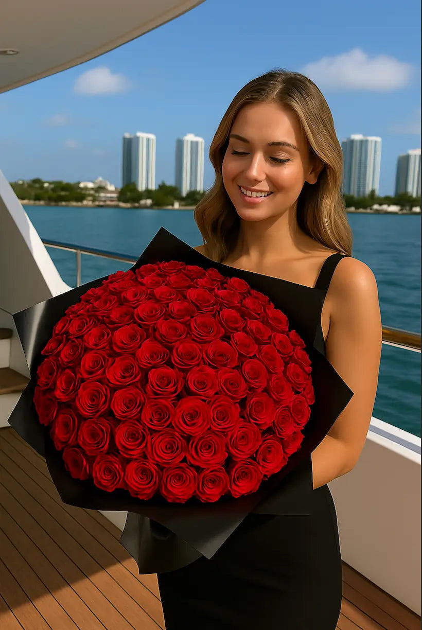 Luxury bouquet with 100 small red roses in dark wrapping â passionate flower delivery Miami