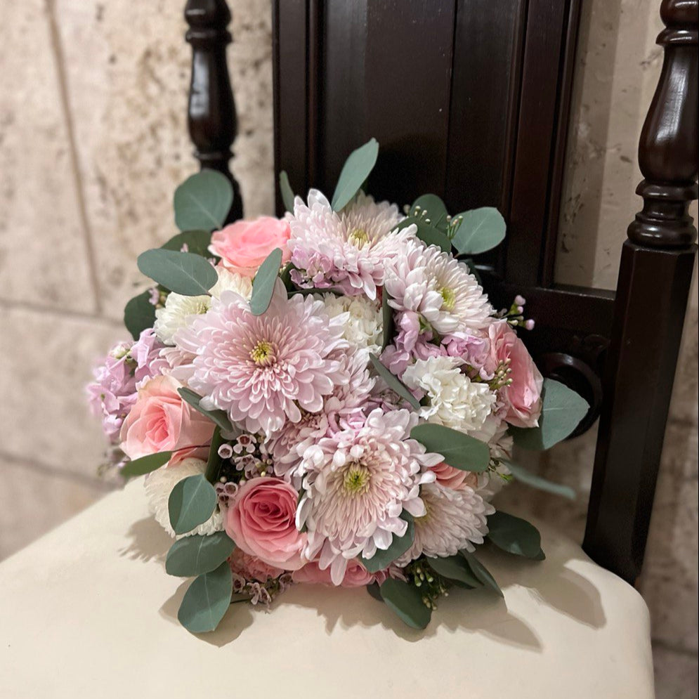 Romantic bouquet with soft pink chrysanthemums and designer wrapping â elegant gift arrangement