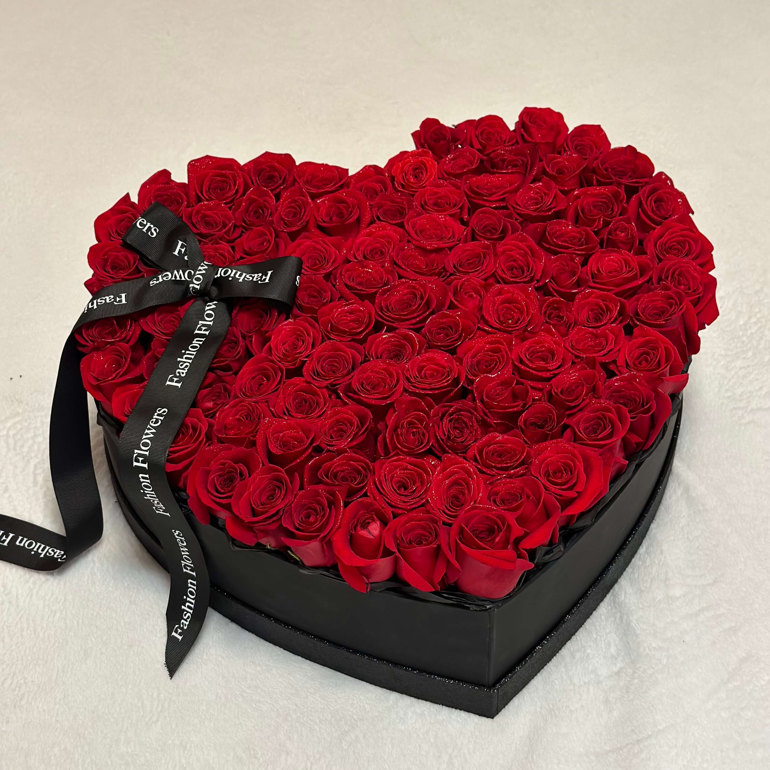 Square photo of heart box with red rose â premium flower box delivery Miami