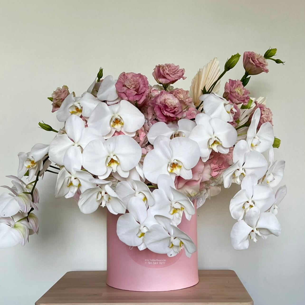 Orchids Garden in designer box with cascading orchids and pink flowers â flower delivery Miami