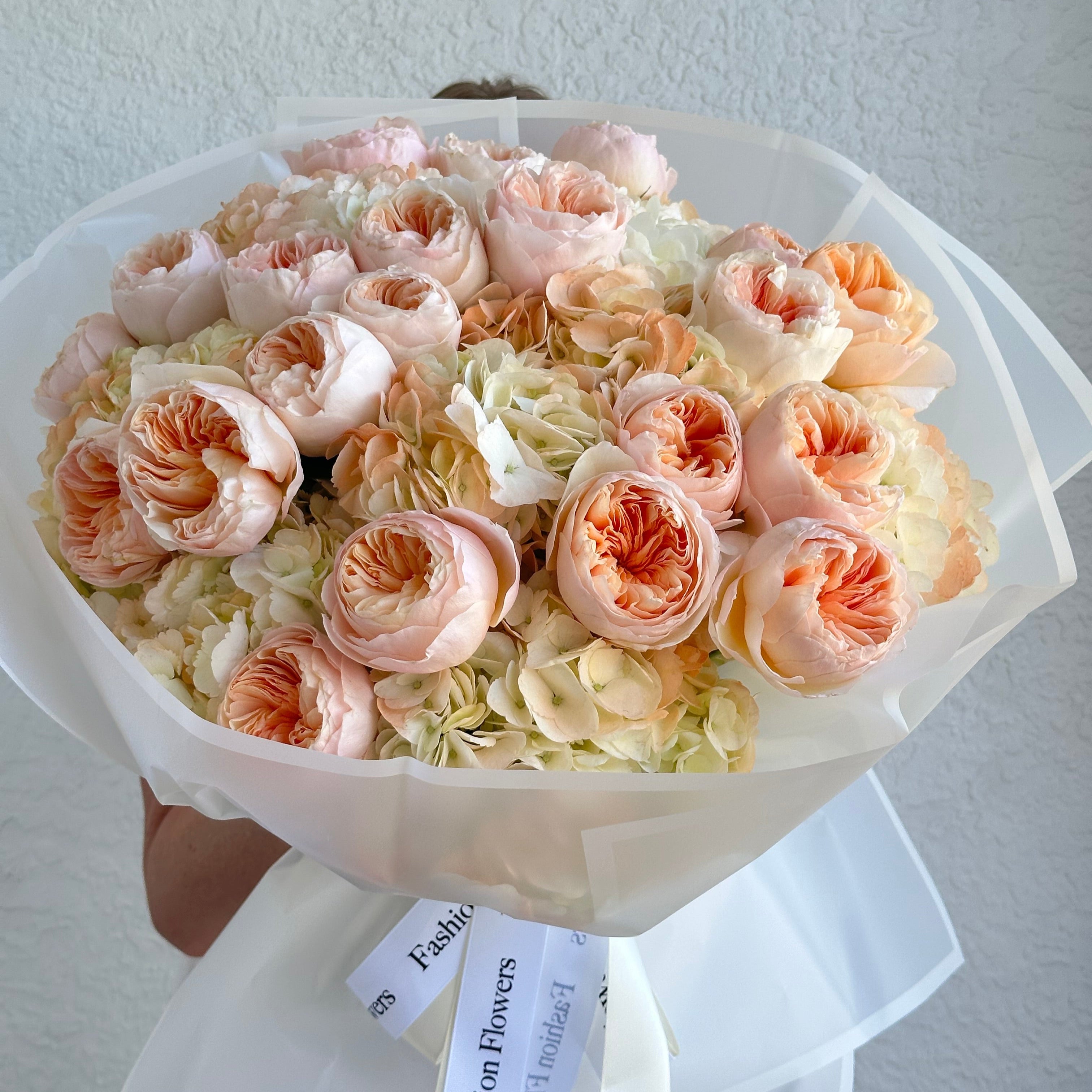 Peach Orchard bouquet of garden roses and hydrangeas in white wrap â Miami luxury