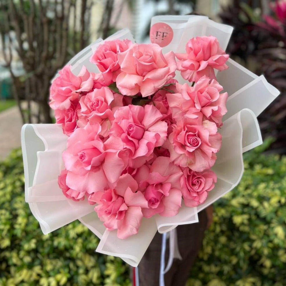 Voluminous hand-tied bouquet âPink Birdâ with soft pink roses and white wrap â flower delivery Miami