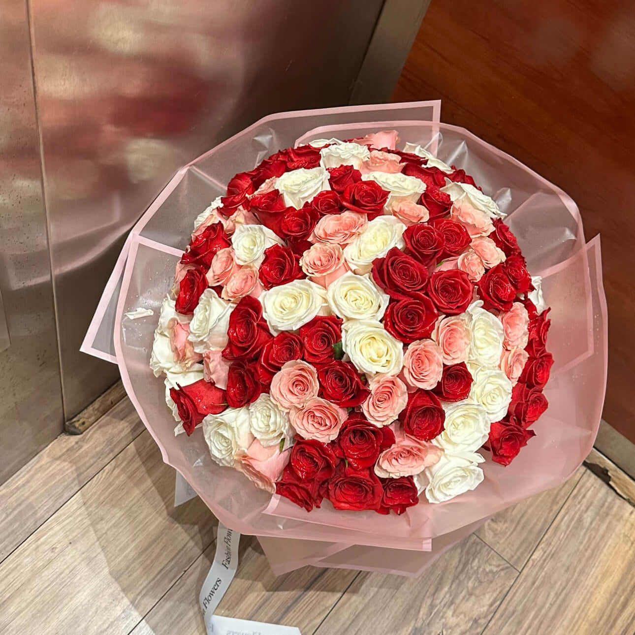 Pretty Mix bouquet with small white, red, and pink roses and a crown — 200-roses luxury flower delivery Miami
