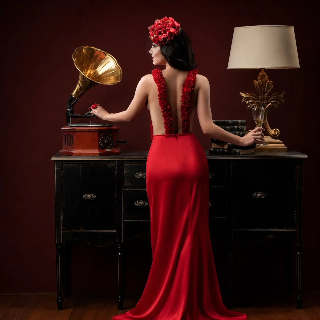 Red Flame luxury wearable floral art featuring red roses, orchids and couture floral headpiece by Miami Flower Delivery.