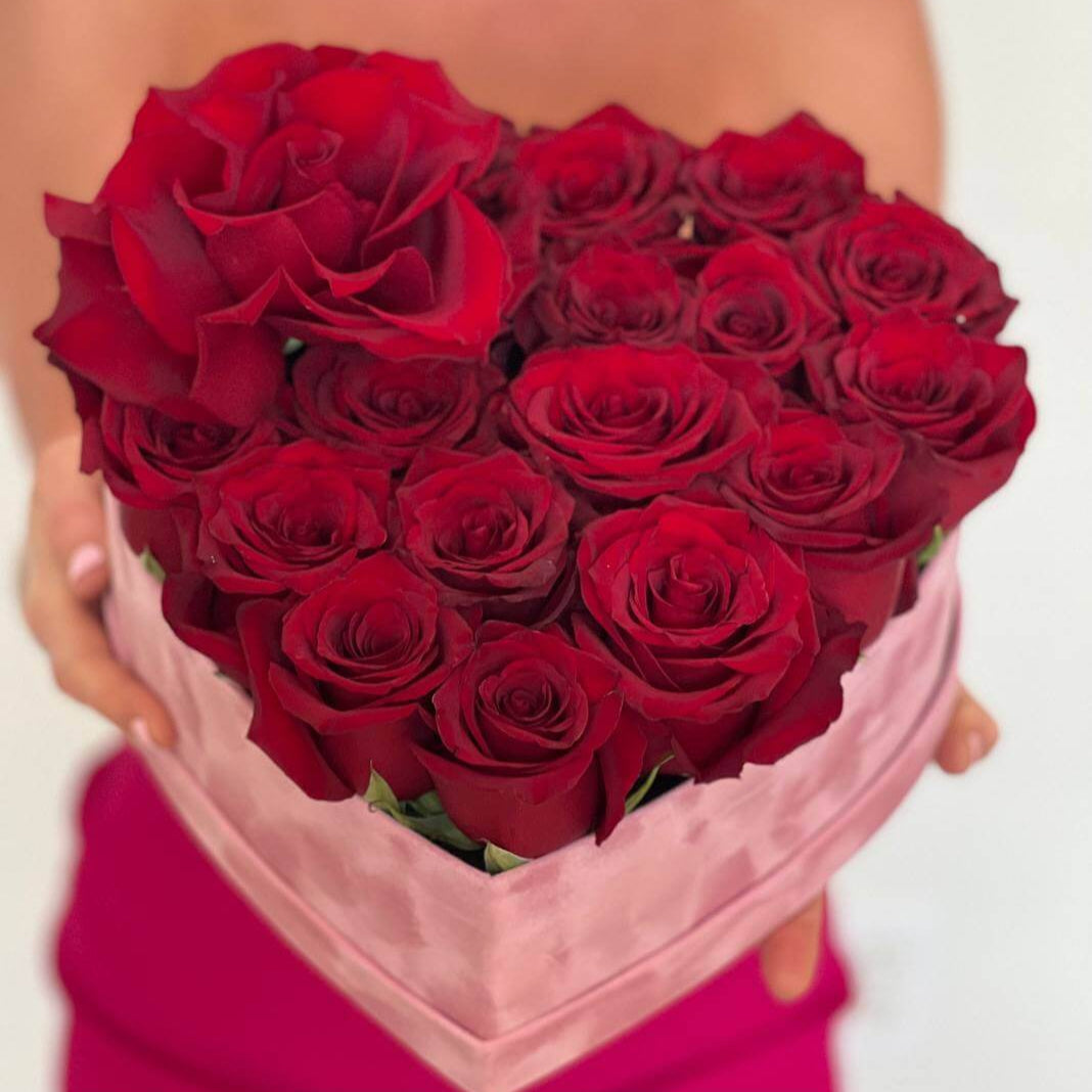Elegant heart-shaped bouquet of 50 red roses in velvet box — luxury Miami flower gift