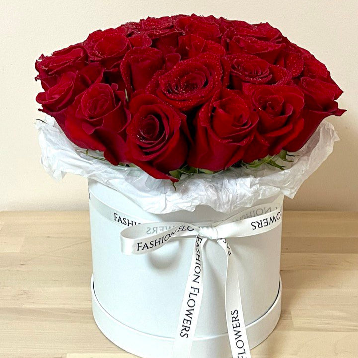 Red in white bouquet with 50 red roses in elegant white box — premium flower gifting Miami