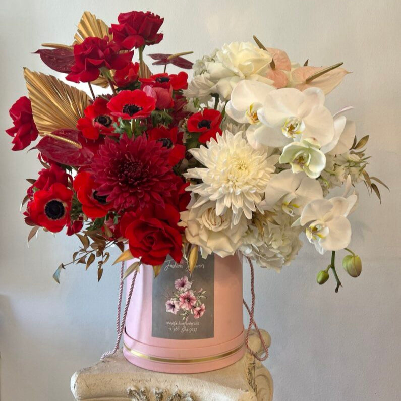Red and white luxury bouquet with roses and orchids in blush box — flower delivery Miami