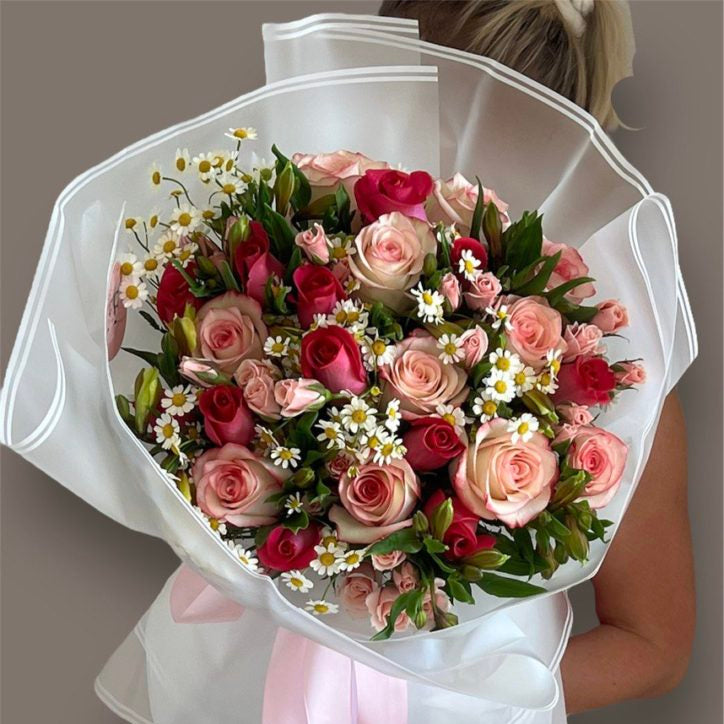 Sun-Kissed bouquet with pink roses and daisies in white wrap — flower delivery