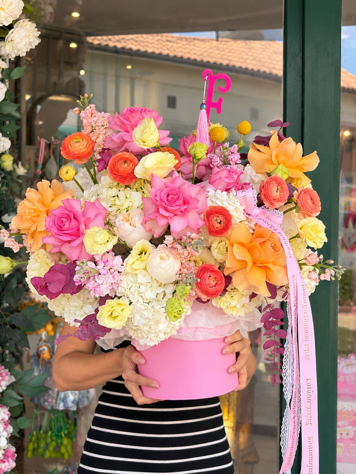 Sunset Fiesta: roses, garden roses, ranunculus, hydrangeas, lisianthus, craspedia in a flower box arrangement