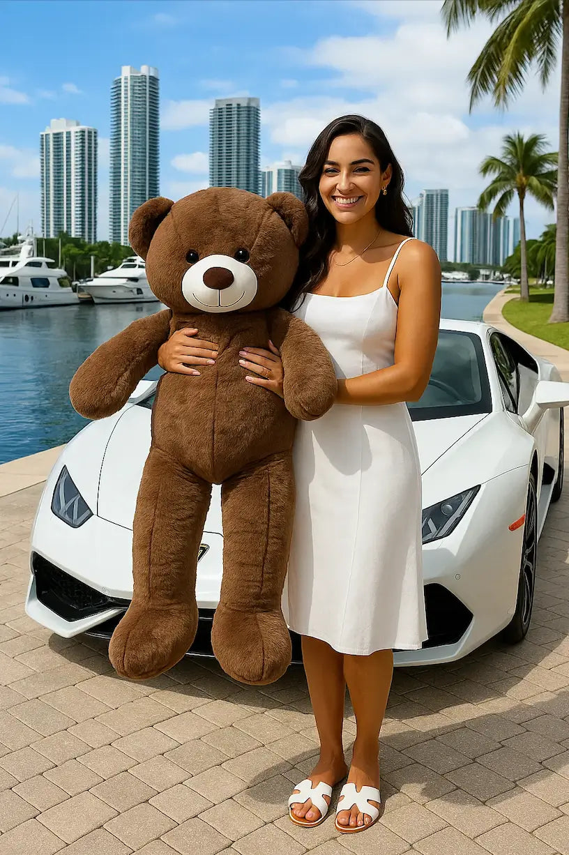 Spanish woman in white dress holding giant brown teddy bear by black Lamborghini — special occasion in Miami