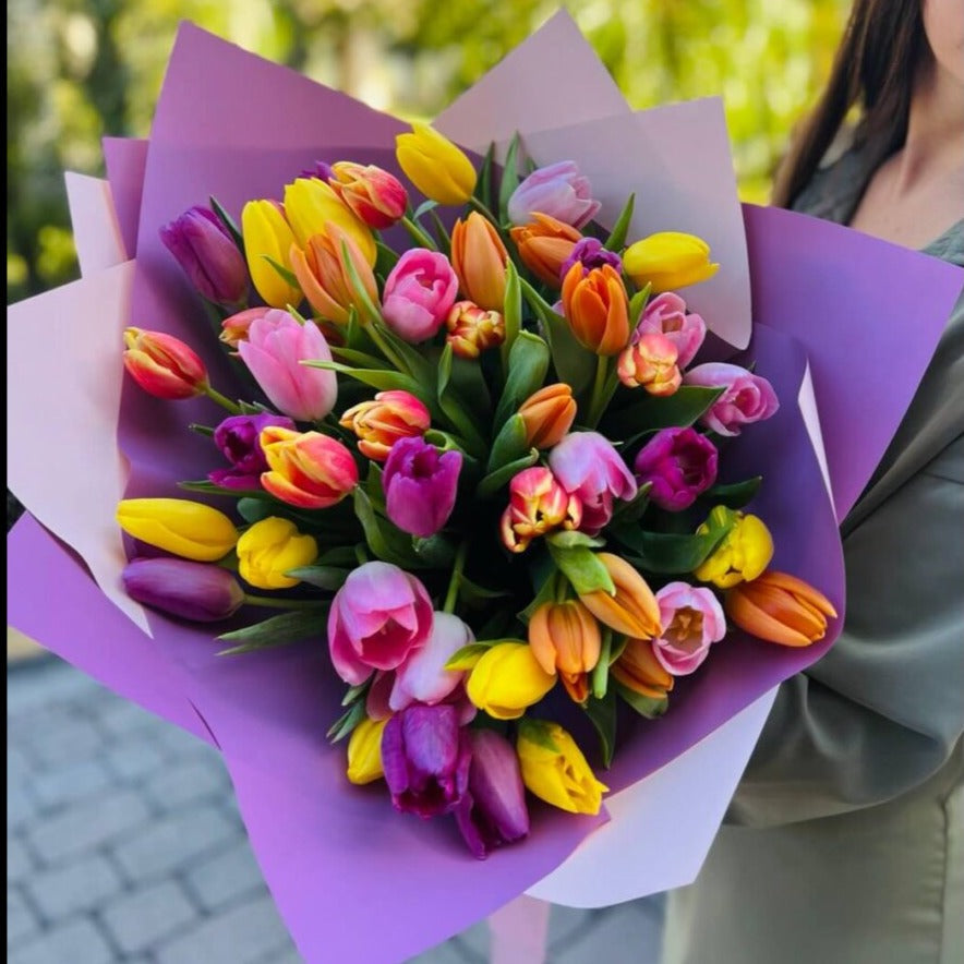 Bright tulip bouquet in lavender wrapping â same-day flower delivery Miami