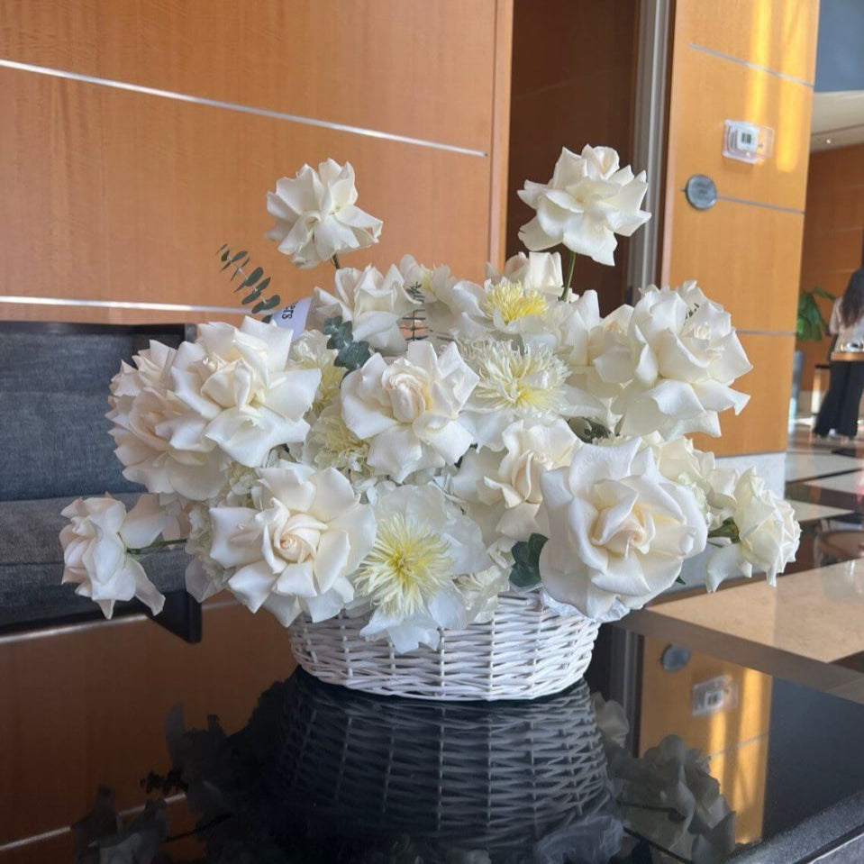 Elegant white rose basket — romantic white floral gift delivery Miami