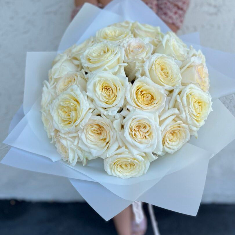 Long hand-tied bouquet of white Ohara roses with ribbon — flower delivery Miami