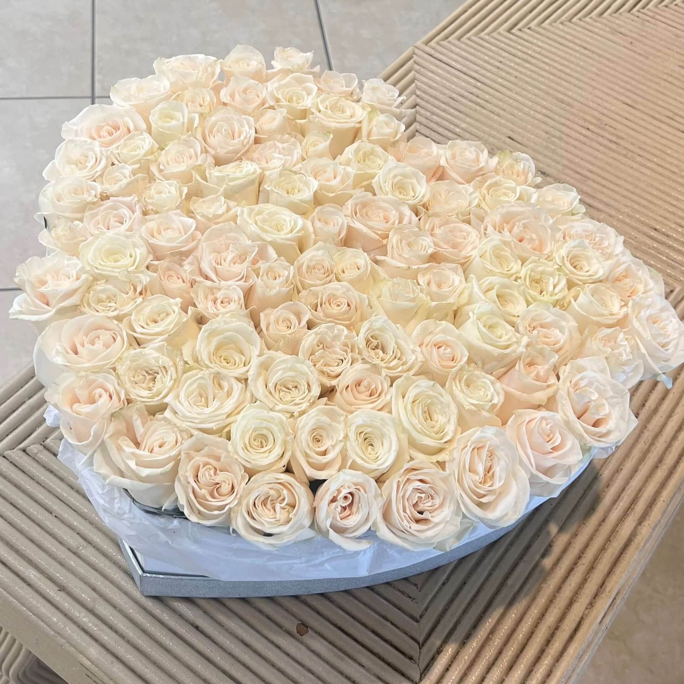 Large white heart-shaped box of roses â premium Miami flower delivery