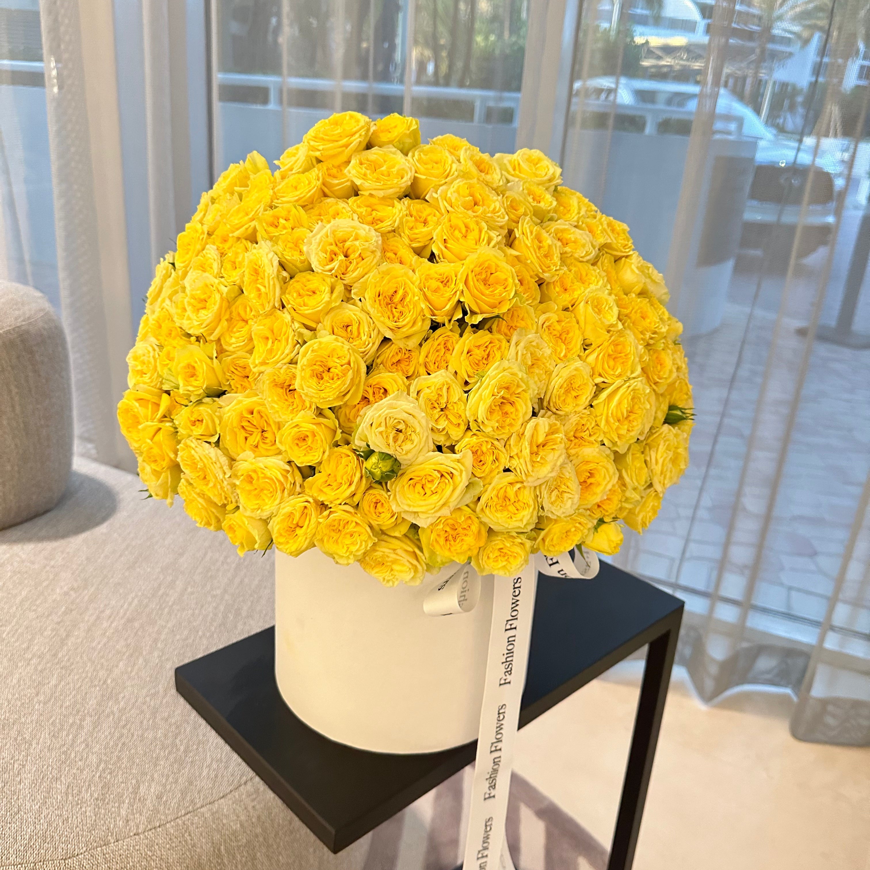 Large white box of yellow roses â elegant flower delivery Miami