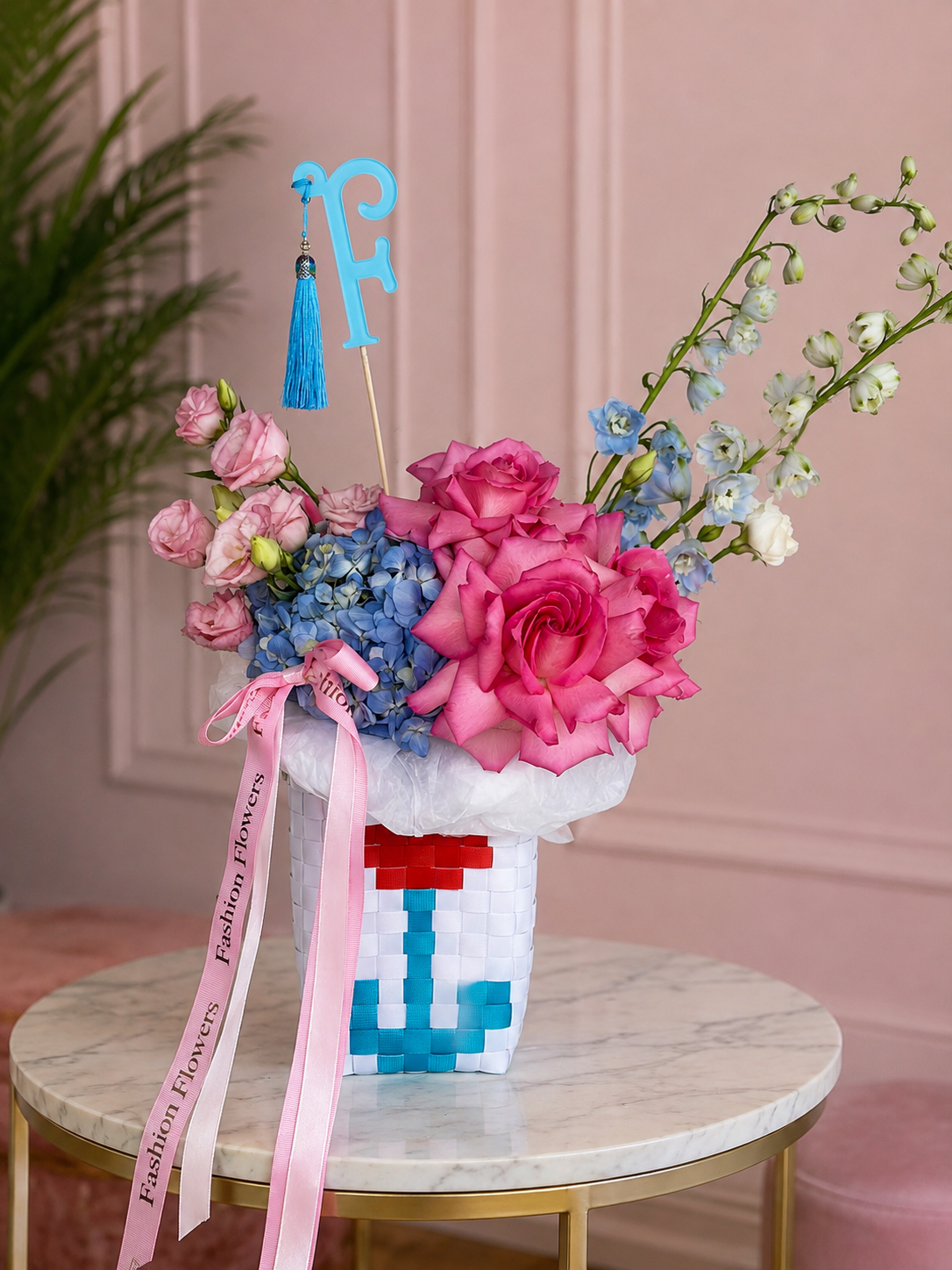 Ocean Kiss: fresh seasonal flowers, ribbons, decorative charms in a flower bag arrangement