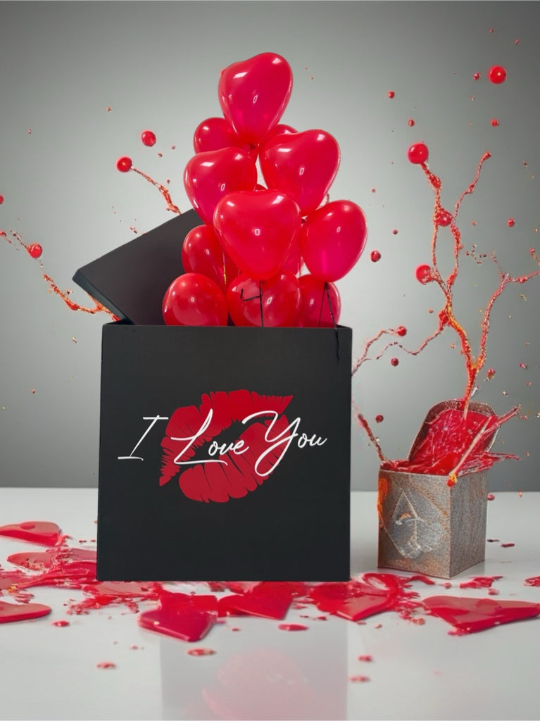 I Love You: red heart balloons, black gift box in a balloon surprise box