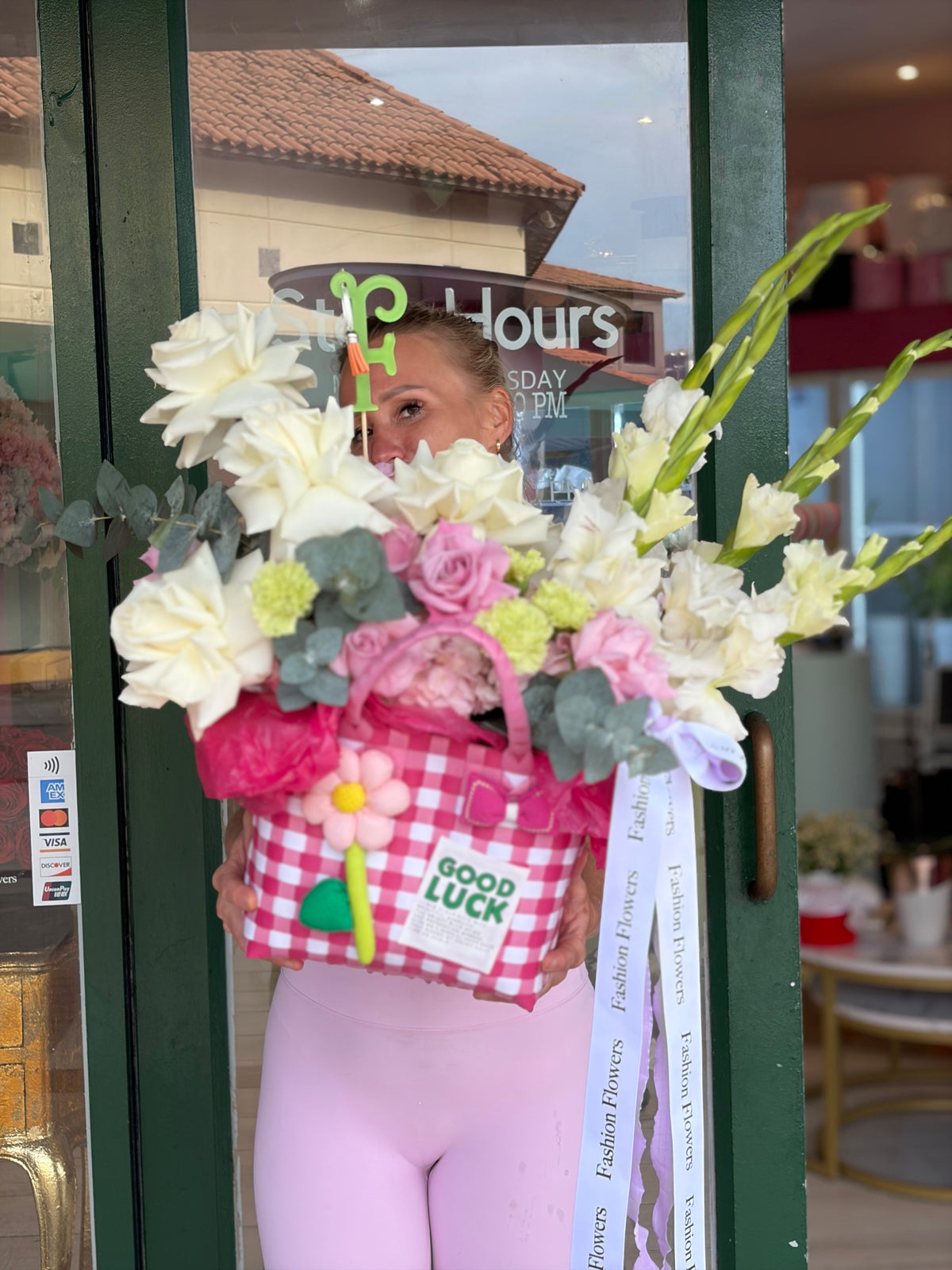 Lucky Bloom flower bag arrangement featuring fresh seasonal flowers, ribbons, decorative accessories