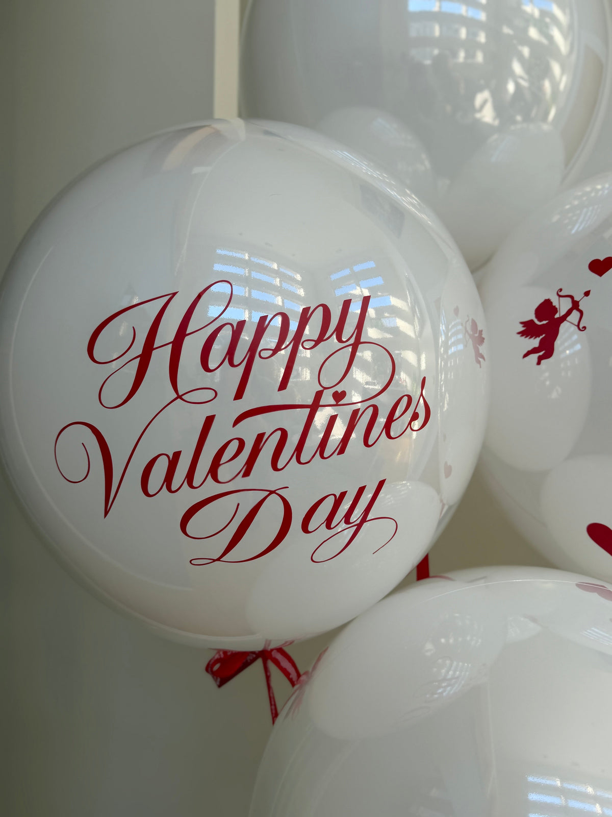 White Love: white balloons, heart and cupid prints in a valentine balloon set