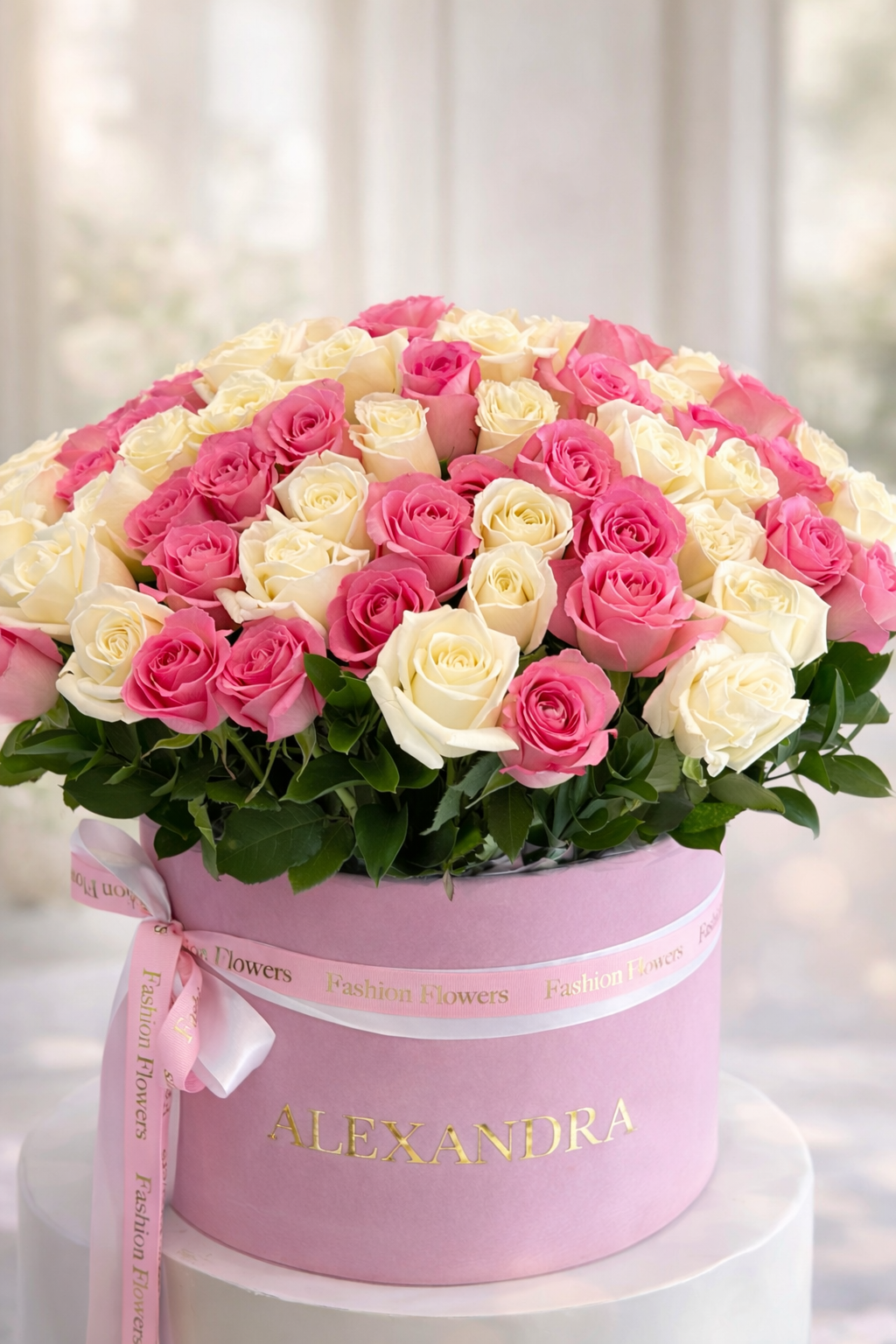 Blush Elegance: 100 pink and white roses in a flower box arrangement
