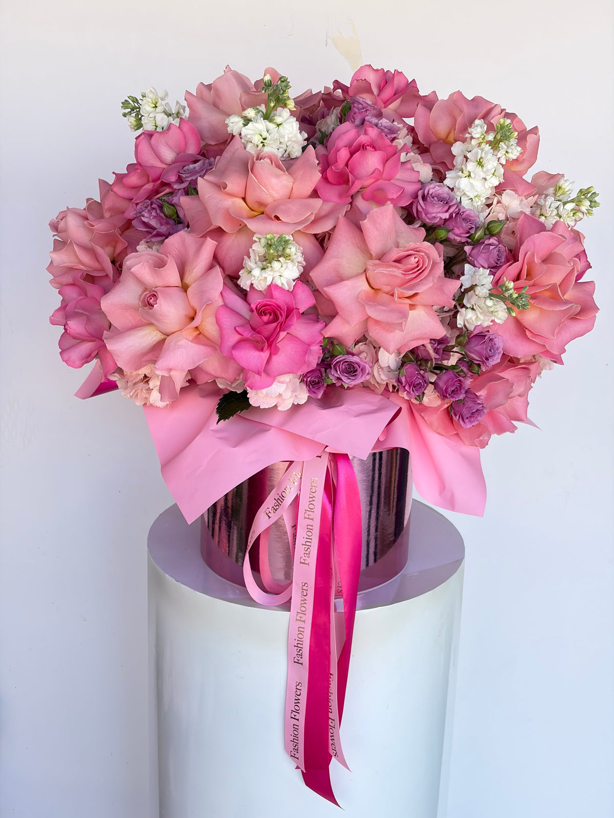 Sapphire Blush: roses, spray roses, seasonal flowers in a flower box arrangement