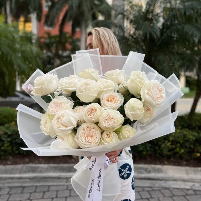 Divine Fragrance in white hand-tied bouquet with cream roses — luxury flower delivery Miami by the pool at elegant villa