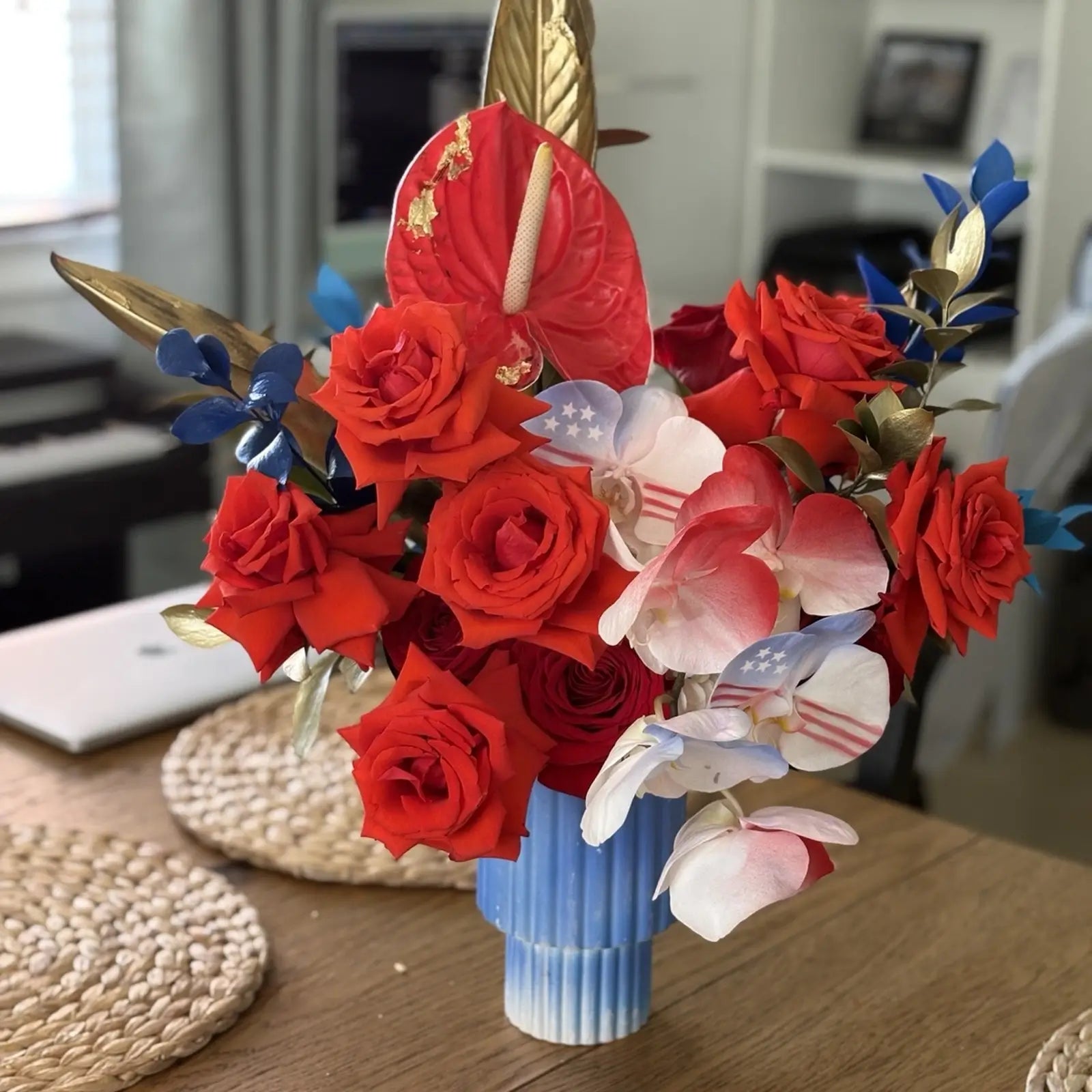Patriotic Harmony luxury flower arrangement featuring red roses, white orchids and designer floral styling by Miami Flower Delivery