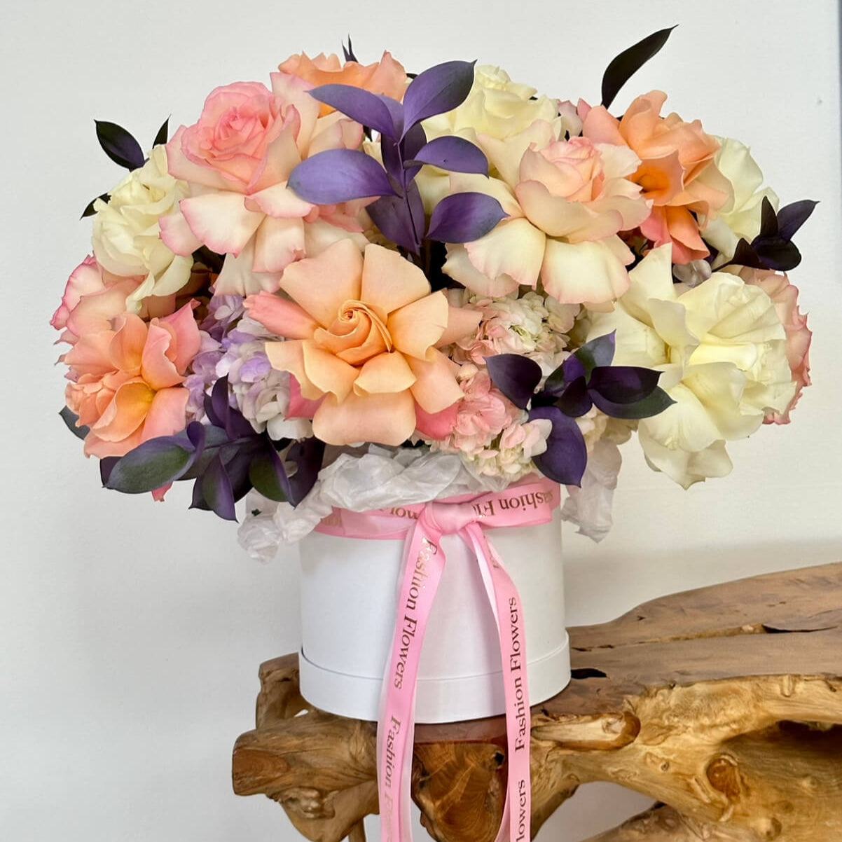 Roses charm bouquet with open pastel roses in white designer box — romantic luxury flower delivery Miami